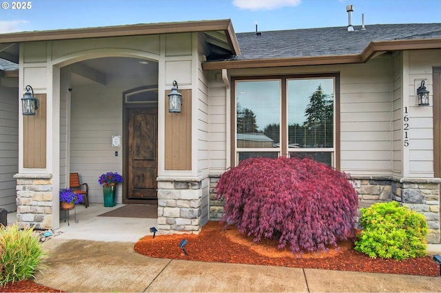 16215 NE 171st Ct, Brush Prairie, WA 98606 - entrance to property with stone siding and a shingled roof