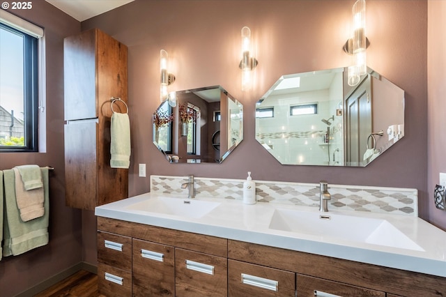 1342 11th St SW, Bandon, OR 97411 - full bathroom featuring double vanity, healthy amount of natural light, and a stall shower