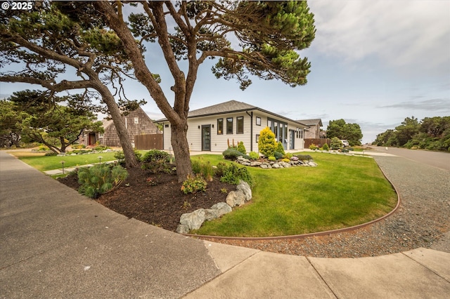 1342 11th St SW, Bandon, OR 97411 - ranch-style home with a garage and driveway