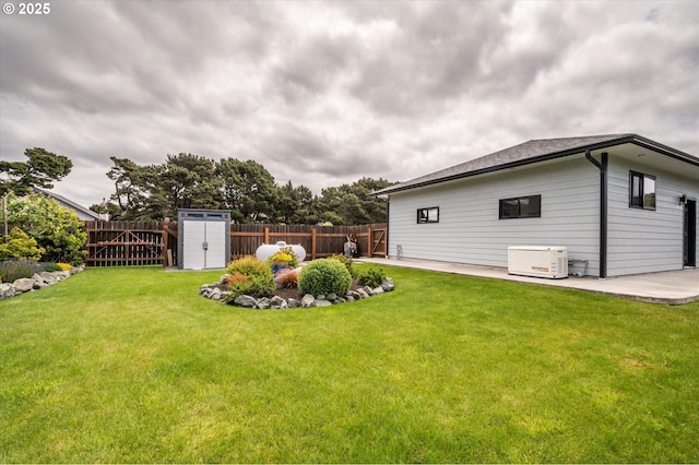 1342 11th St SW, Bandon, OR 97411 - fenced backyard featuring a patio and a storage shed