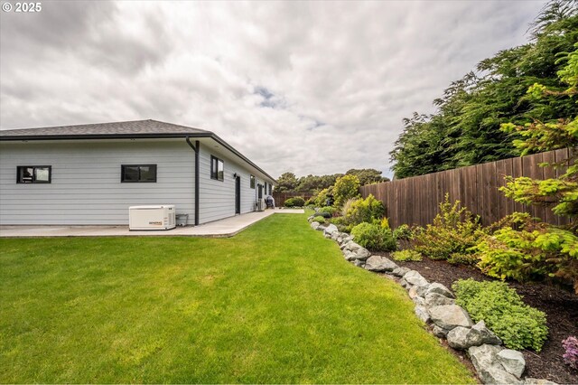 1342 11th St SW, Bandon, OR 97411 - fenced backyard with a patio