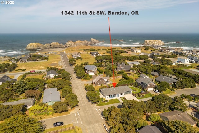 1342 11th St SW, Bandon, OR 97411 - aerial perspective of suburban area with a nearby body of water