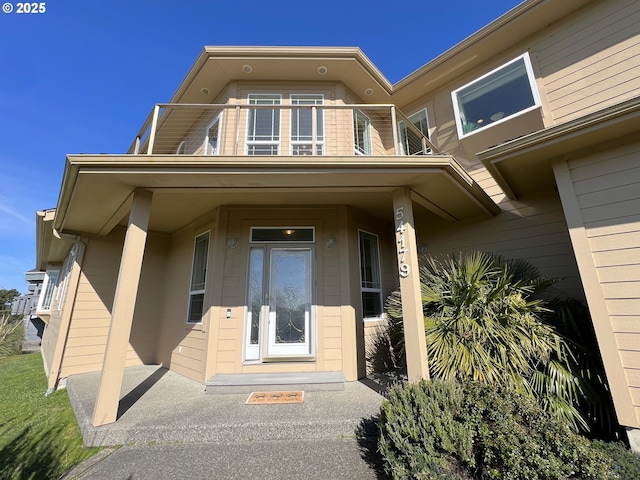 54179 Gould Rd, Bandon, OR 97411 - doorway to property with a balcony
