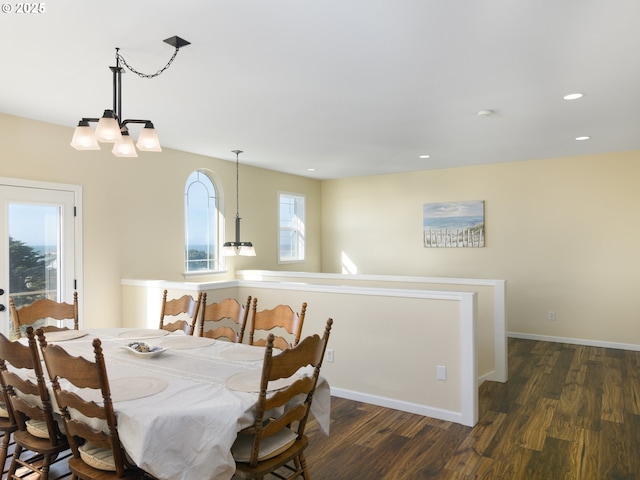 54179 Gould Rd, Bandon, OR 97411 - dining room with wood finished floors, baseboards, recessed lighting, and a chandelier