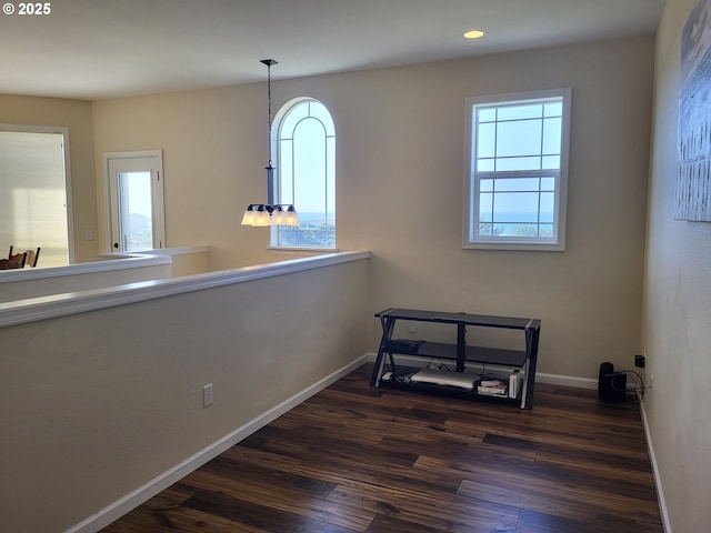 54179 Gould Rd, Bandon, OR 97411 - hall with dark wood-style flooring, plenty of natural light, baseboards, and recessed lighting