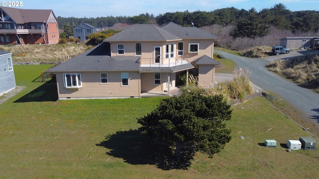 54179 Gould Rd, Bandon, OR 97411 - rear view of house featuring crawl space and a yard