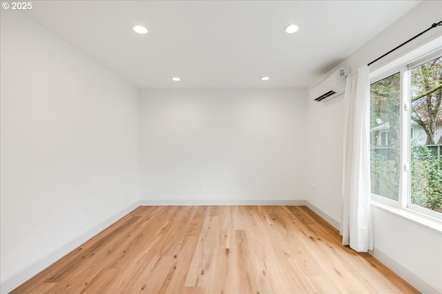 7143 SW Sagert St Unit 106, Tualatin, OR 97062 - entryway featuring recessed lighting, baseboards, wood finished floors, and a wall mounted air conditioner