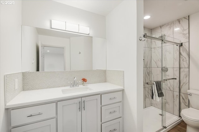 7143 SW Sagert St Unit 106, Tualatin, OR 97062 - unfurnished bedroom featuring a spacious closet, baseboards, recessed lighting, light wood-style flooring, and a closet