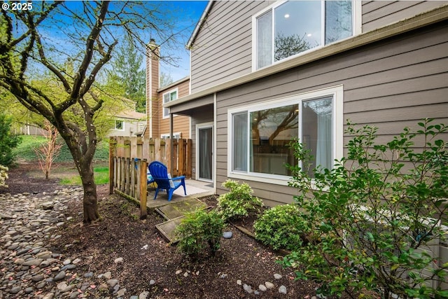 7143 SW Sagert St Unit 106, Tualatin, OR 97062 - bathroom with separate washer and dryer, toilet, vanity, and baseboards