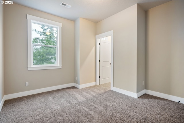 view of carpeted spare room