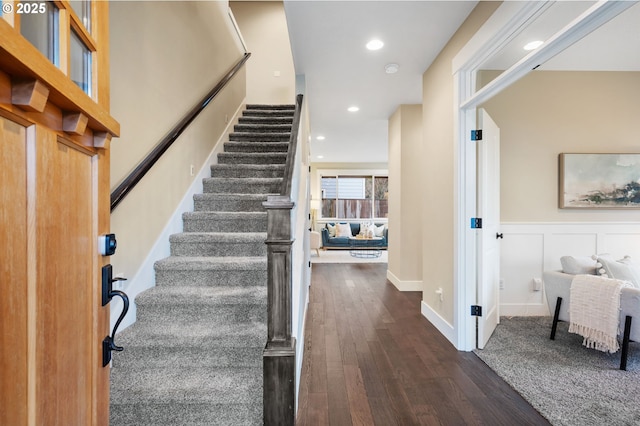 entryway with dark wood-type flooring