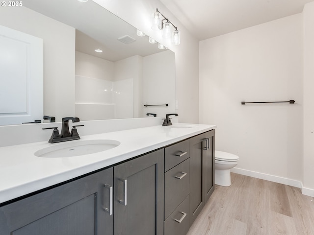 736 NW 178th Way, Ridgefield, WA 98642 - bathroom with wood finished floors, double vanity, and a shower