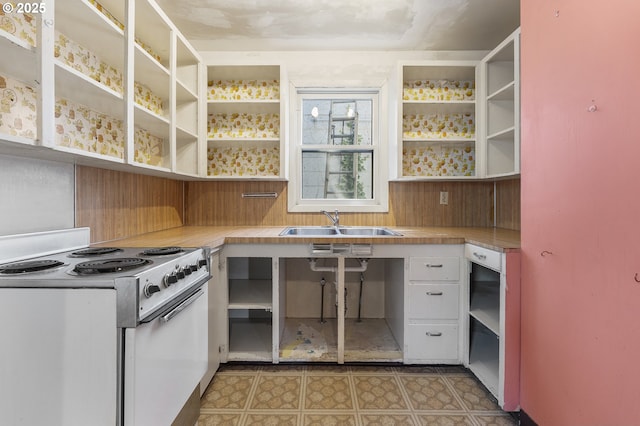 1904 SE Alder St, Portland, OR 97214 - kitchen featuring white electric range, open shelves, a sink, and white cabinets