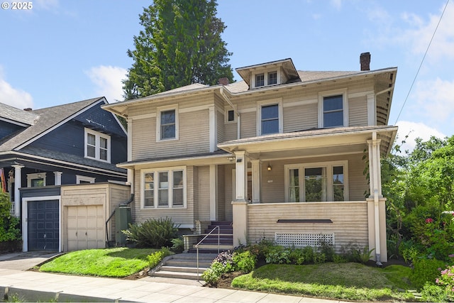 1904 SE Alder St, Portland, OR 97214 - traditional style home featuring a porch, a chimney, an attached garage, and driveway