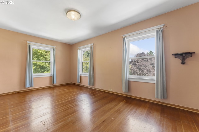 1904 SE Alder St, Portland, OR 97214 - empty room with hardwood / wood-style flooring and baseboards
