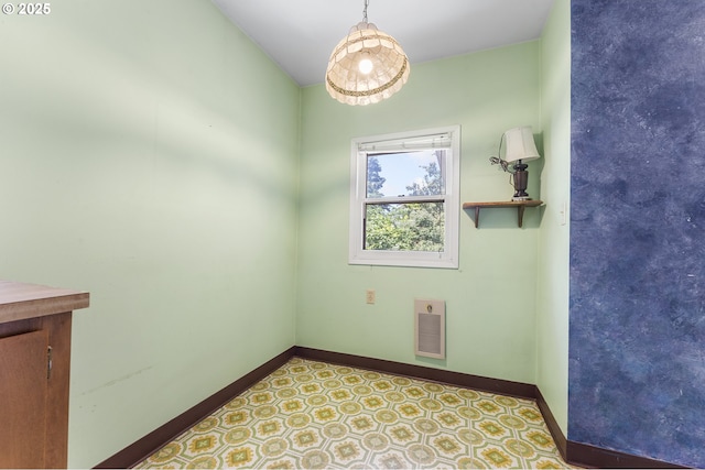 1904 SE Alder St, Portland, OR 97214 - empty room featuring baseboards and tile patterned floors