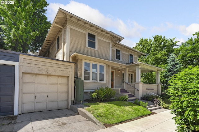 1904 SE Alder St, Portland, OR 97214 - view of front of property featuring a garage, concrete driveway, covered porch, and a front lawn