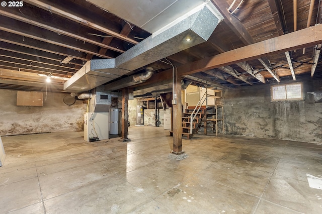 1904 SE Alder St, Portland, OR 97214 - below grade area with strapped water heater, gas water heater, heating unit, and stairway