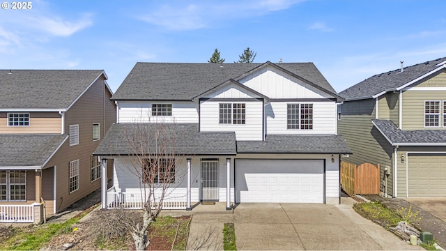 13007 SE Raymond Ct, Portland, OR 97236 - view of front of property with covered porch, driveway, a shingled roof, a garage, and board and batten siding