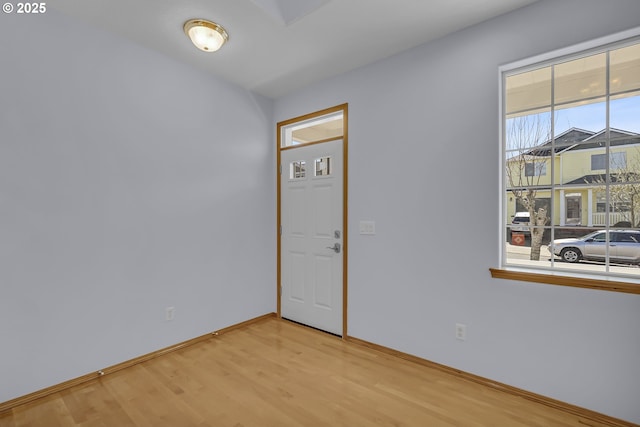 13007 SE Raymond Ct, Portland, OR 97236 - foyer entrance featuring light wood-style floors and baseboards