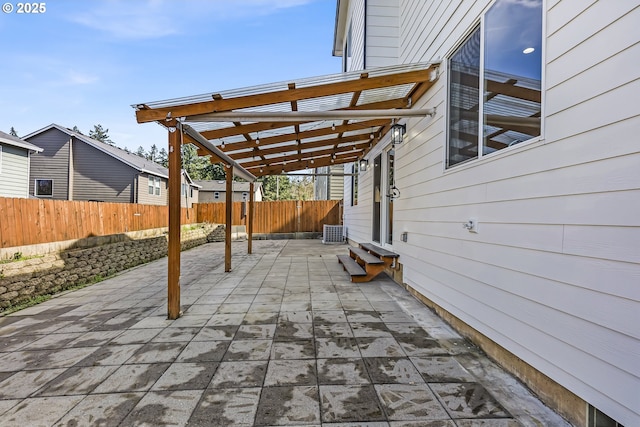 13007 SE Raymond Ct, Portland, OR 97236 - fenced backyard featuring a patio, a pergola, and entry steps
