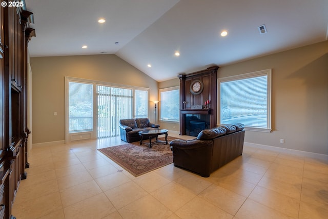 703 SE Keel Ave, Lincoln City, OR 97367 - living room with a fireplace, recessed lighting, visible vents, vaulted ceiling, and baseboards