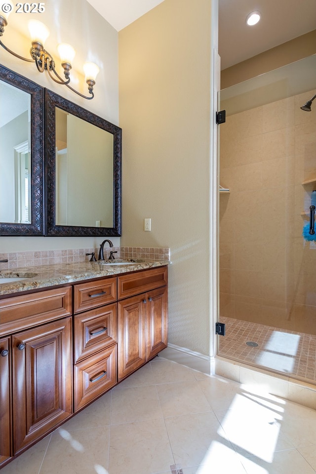703 SE Keel Ave, Lincoln City, OR 97367 - full bath with a stall shower, tile patterned flooring, a sink, and double vanity
