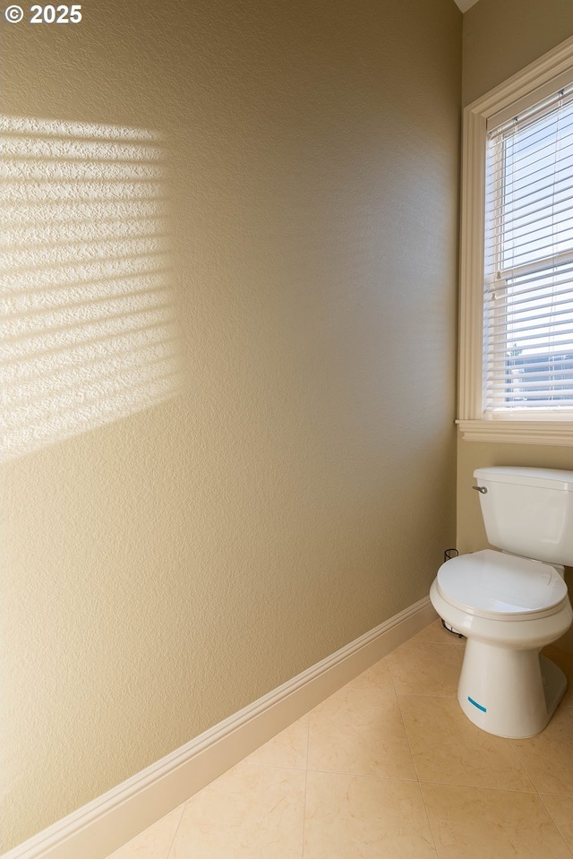 703 SE Keel Ave, Lincoln City, OR 97367 - bathroom with toilet, baseboards, and tile patterned floors