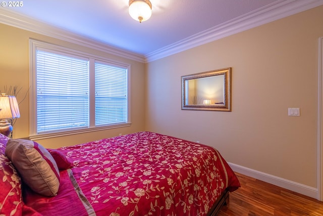 703 SE Keel Ave, Lincoln City, OR 97367 - bedroom featuring crown molding, baseboards, and wood finished floors