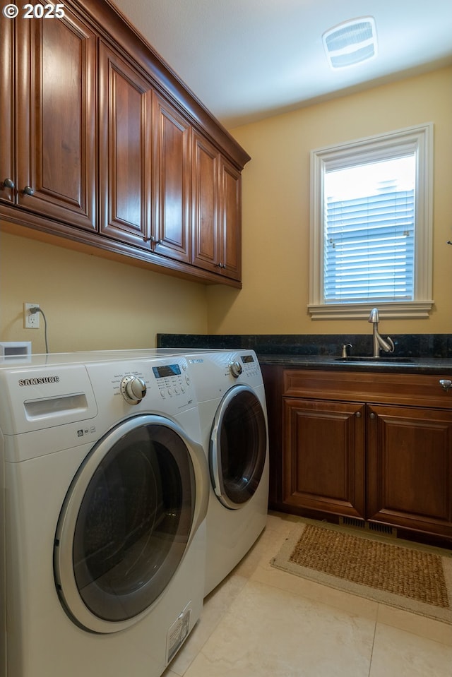 703 SE Keel Ave, Lincoln City, OR 97367 - clothes washing area with visible vents, separate washer and dryer, a sink, and cabinet space