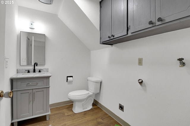 522 River Loop Unit 2, Eugene, OR 97404 - bathroom featuring vanity, wood finished floors, and lofted ceiling