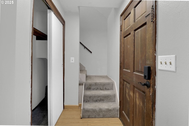 522 River Loop Unit 2, Eugene, OR 97404 - foyer featuring stairs and light wood-type flooring