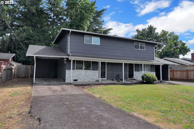522 River Loop Unit 2, Eugene, OR 97404 - view of front facade with asphalt driveway and a carport