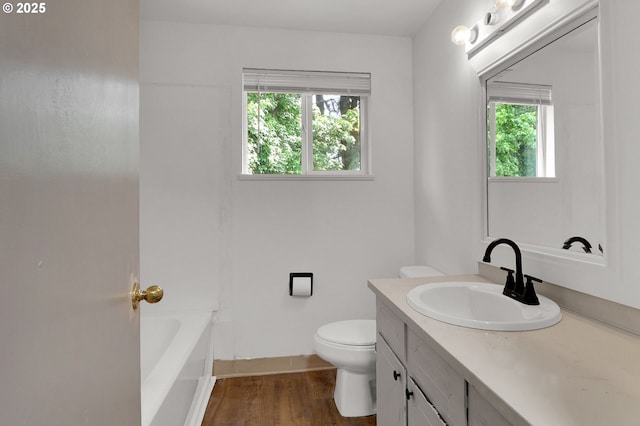 522 River Loop Unit 2, Eugene, OR 97404 - full bathroom with vanity, wood finished floors, a bath, and a shower