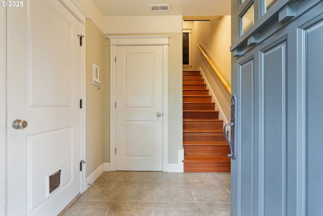 2036 NW Village Cir, Portland, OR 97229 - entrance foyer with stairway and baseboards