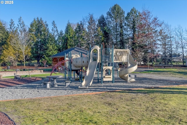 view of jungle gym with a lawn