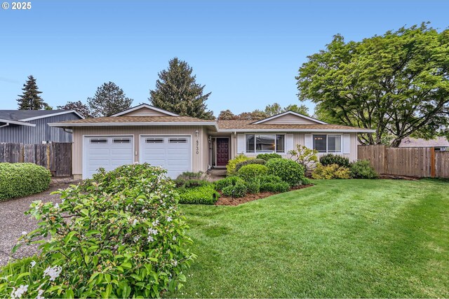 4730 SW 189th Pl, Beaverton, OR 97078 - single story home with fence, an attached garage, a shingled roof, a front lawn, and driveway