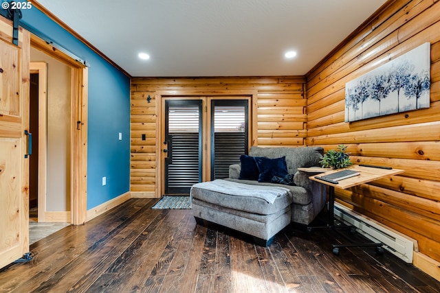 86561 R R Baker Rd, Springfield, OR 97478 - living area with a baseboard radiator, dark wood-style flooring, recessed lighting, baseboards, and rustic walls