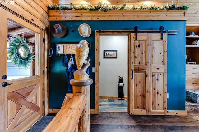 86561 R R Baker Rd, Springfield, OR 97478 - hall with a barn door, wood-type flooring, and baseboards