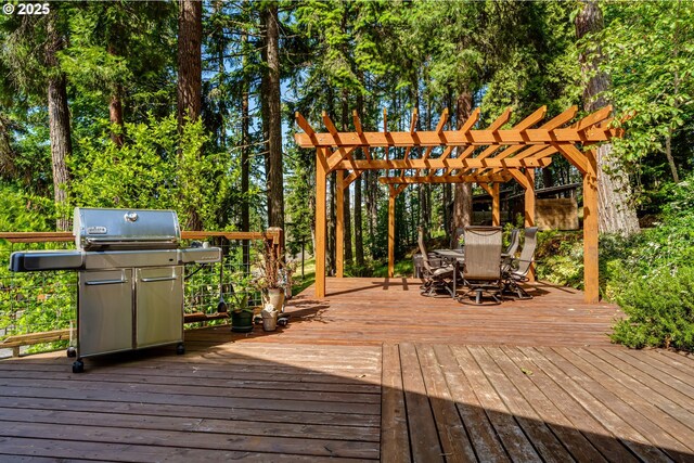 86561 R R Baker Rd, Springfield, OR 97478 - wooden terrace featuring outdoor dining space, grilling area, and a pergola