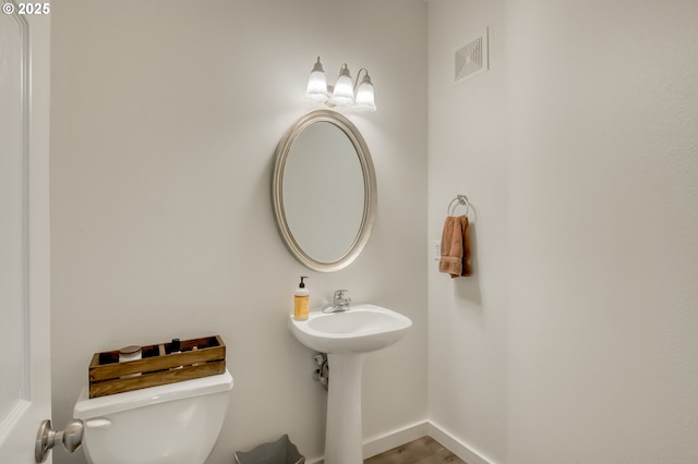 11220 SW Buffalo Pl, Tigard, OR 97223 - half bath featuring toilet and baseboards