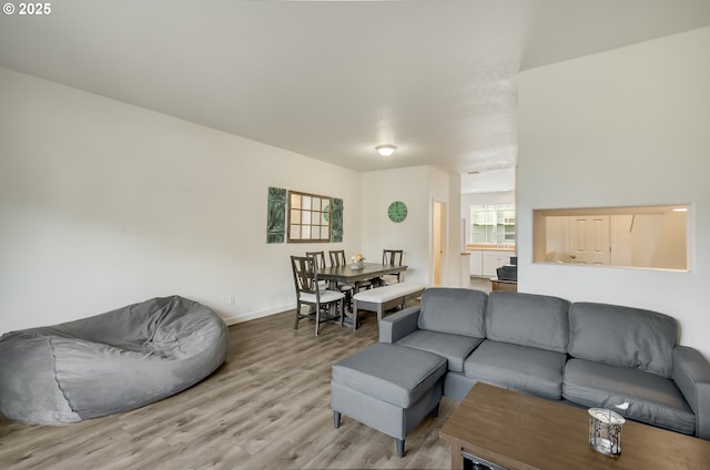 11220 SW Buffalo Pl, Tigard, OR 97223 - living area with light wood-type flooring and baseboards