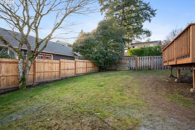 view of yard with a deck