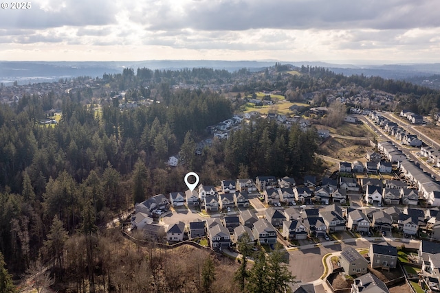 aerial view with a residential view and a forest view