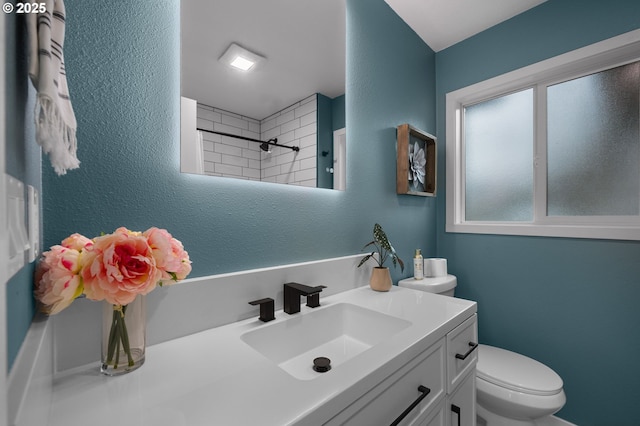 4112 NE 80th Ave, Portland, OR 97218 - full bath with toilet, vanity, a shower, and a textured wall