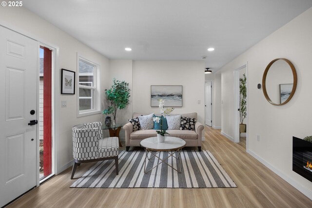 dining area featuring wood finished floors and baseboards