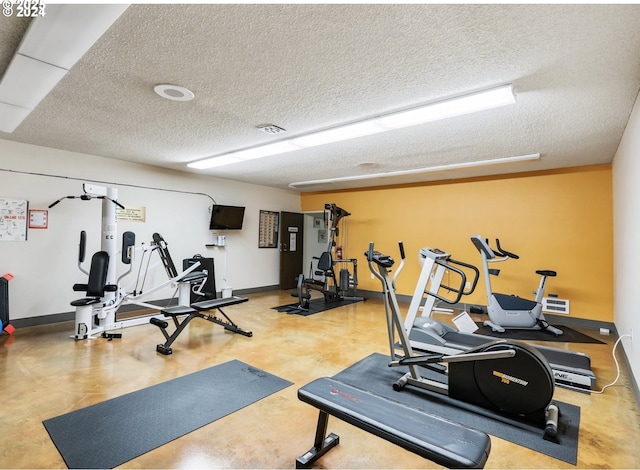 interior space with a textured ceiling