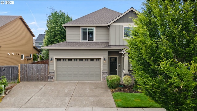 12795 Lindsay Anne Ln, Oregon City, OR 97045 - craftsman-style home with board and batten siding, a garage, a shingled roof, driveway, and stone siding