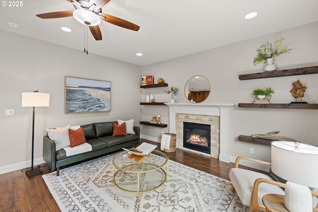 12795 Lindsay Anne Ln, Oregon City, OR 97045 - living room featuring recessed lighting, wood finished floors, baseboards, a ceiling fan, and a stone fireplace