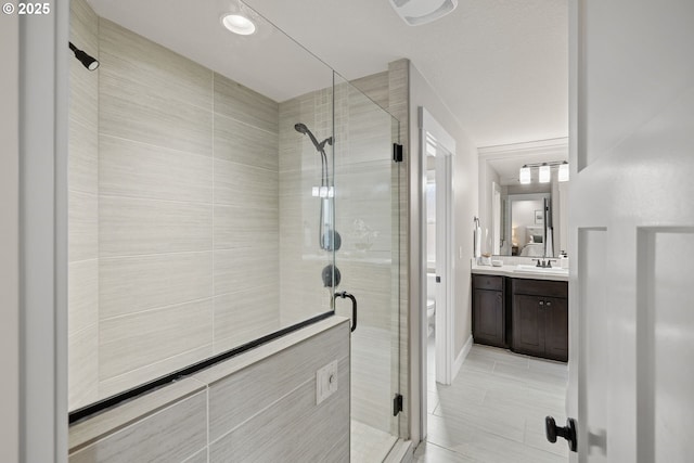 12795 Lindsay Anne Ln, Oregon City, OR 97045 - full bathroom featuring a shower stall, vanity, toilet, and tile patterned floors